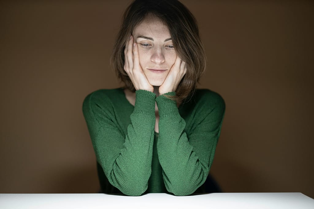He's in Love With His Ex: 9 Subtle Clues 9 somber woman with her hands on her face