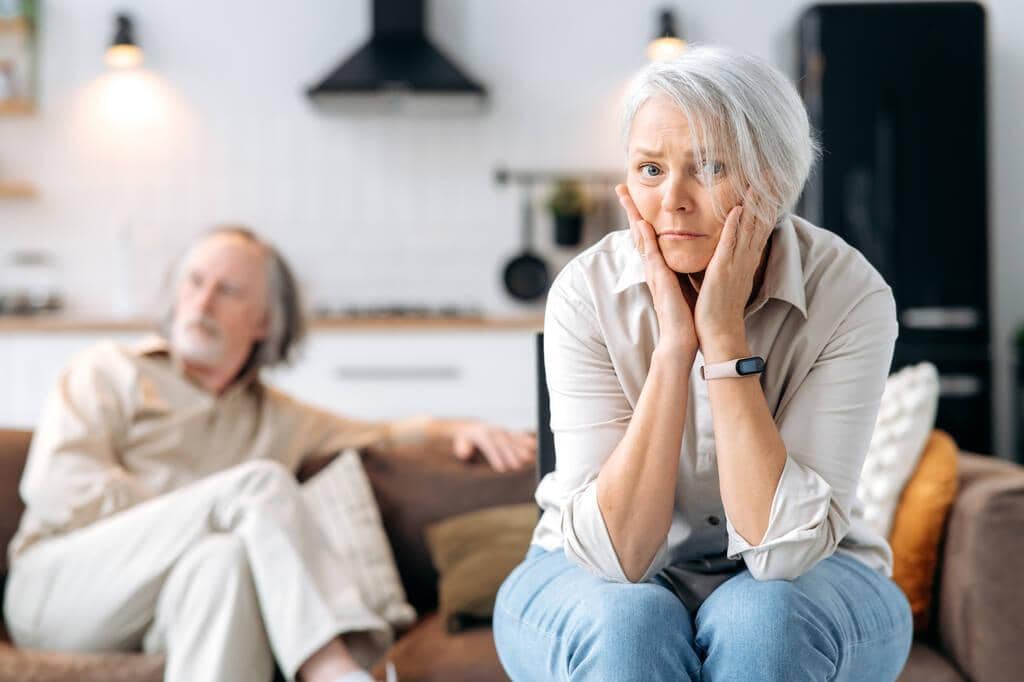 4 Unforeseen Gray Divorce Regrets: Navigating Life's Unexpected Detour 2 Senior Couple looking miserable