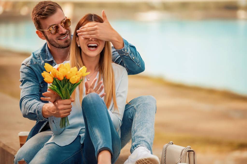 Avoid These 18 Relationship Deal Breakers at All Costs 7 happy young couple having fun outdoors smiling 1