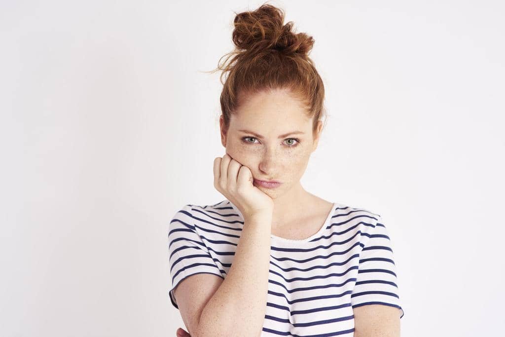 9 Toxic Excuses That Wreck Marriages: Stop the Blame Game 13 portrait bored resentful woman studio shot