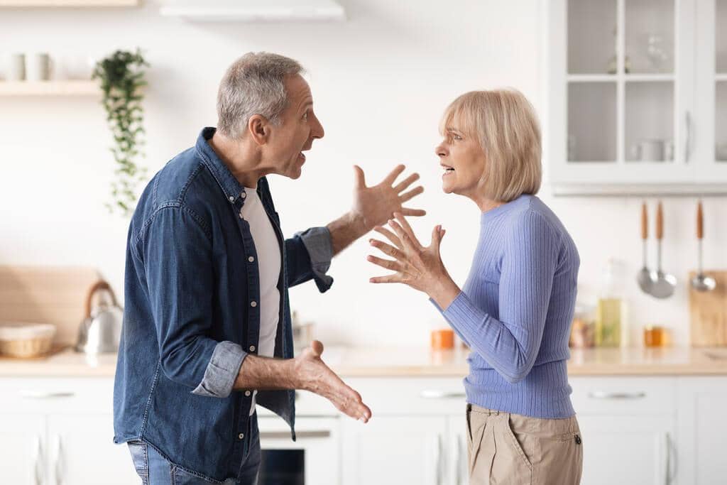 9 Shocking Ways Men Use Anger as Control in Relationships 5 elderly couple arguing during cooking lunch at kitchen