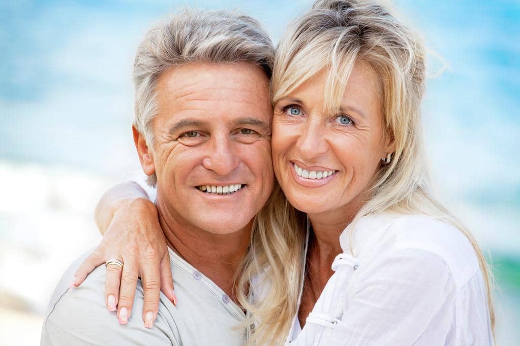 Why Marriage Gets Harder After 50: 9 Unique Challenges 3 happy romantic couple outdoors