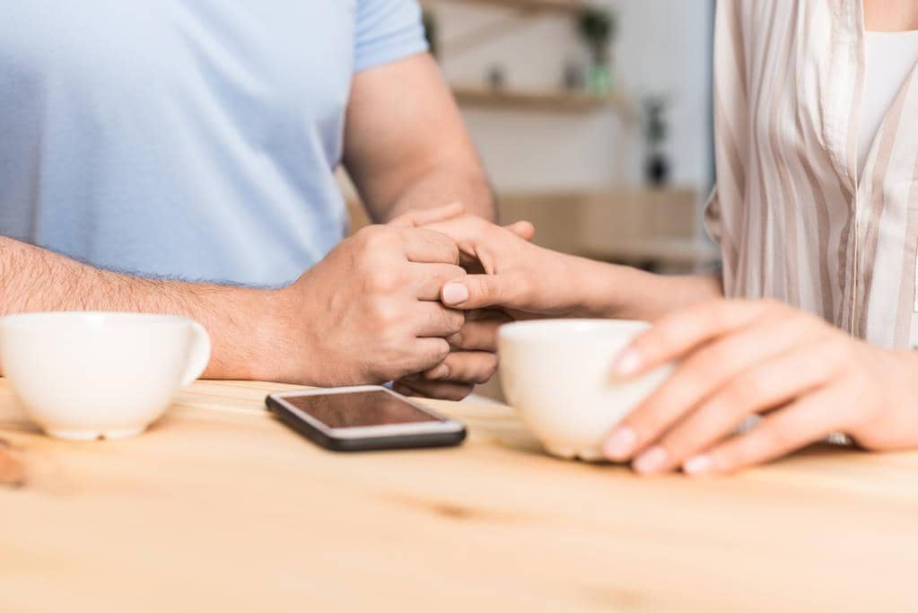 What Emotional Safety in a Relationship Really Looks Like 6 couple dating in cafe