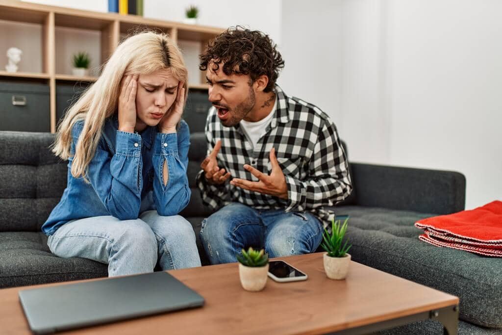 Anger in Marriage: 15 Critical Warnings Your Husband’s Rage Is Tearing You Apart 5 young couple sitting sofa discussing home