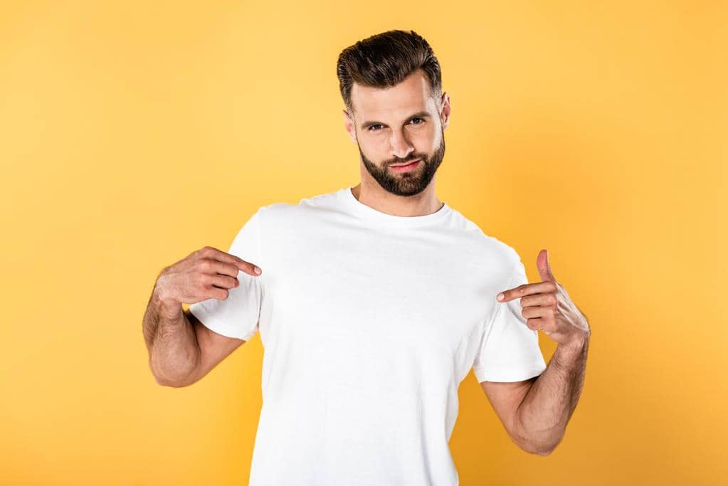 Narcissism Uncovered: 10 Toxic Traits of a Narcissist You Can’t Ignore 5 egotistical handsome man white shirt pointing fingers himself isolated yellow