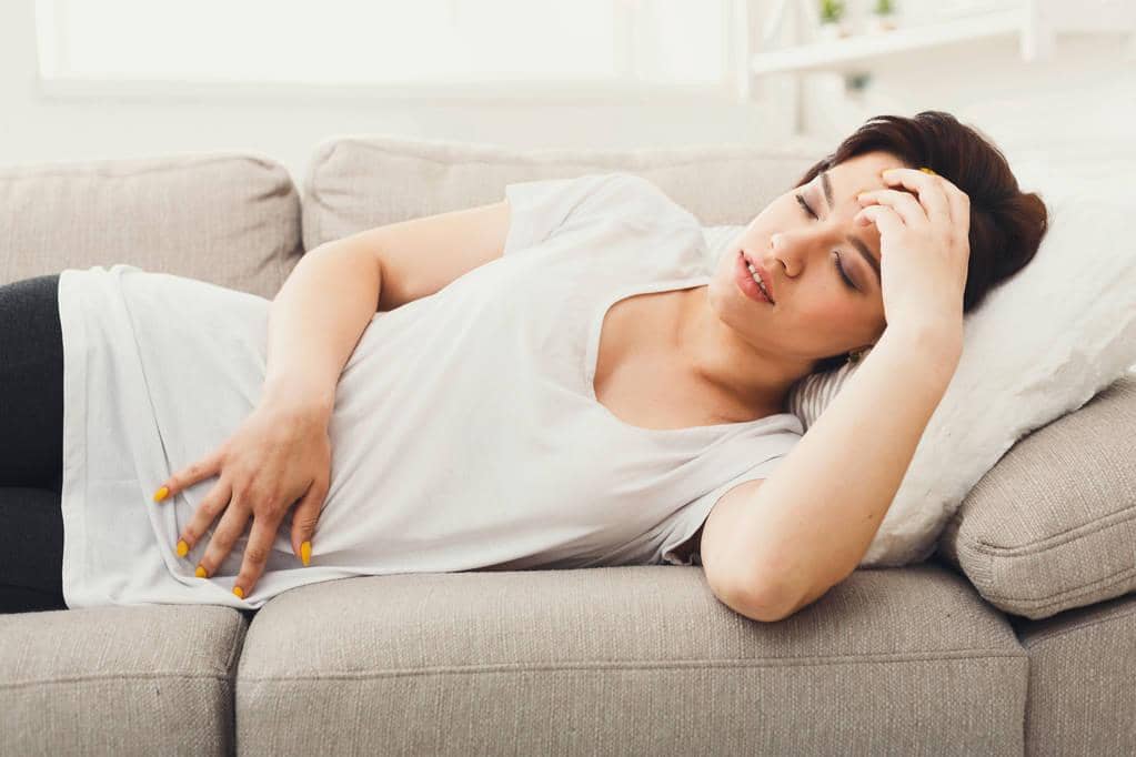 9 Ways Intermittent Reinforcement Keeps You Stuck in Toxic Relationships 9 stock photo casual brunette girl feeling pain