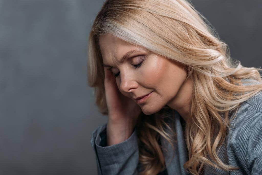 Listen to Your Body: 9 Physical Warning Signs of a Toxic Relationship 4 Woman with headache
