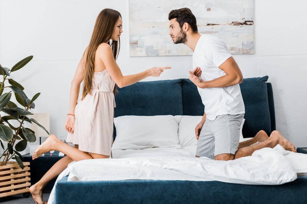 Resentment in Marriage: The 10 Disastrous Root Causes 14 stock photo young attractive woman poiting finger angrily stressed gesturing man while
