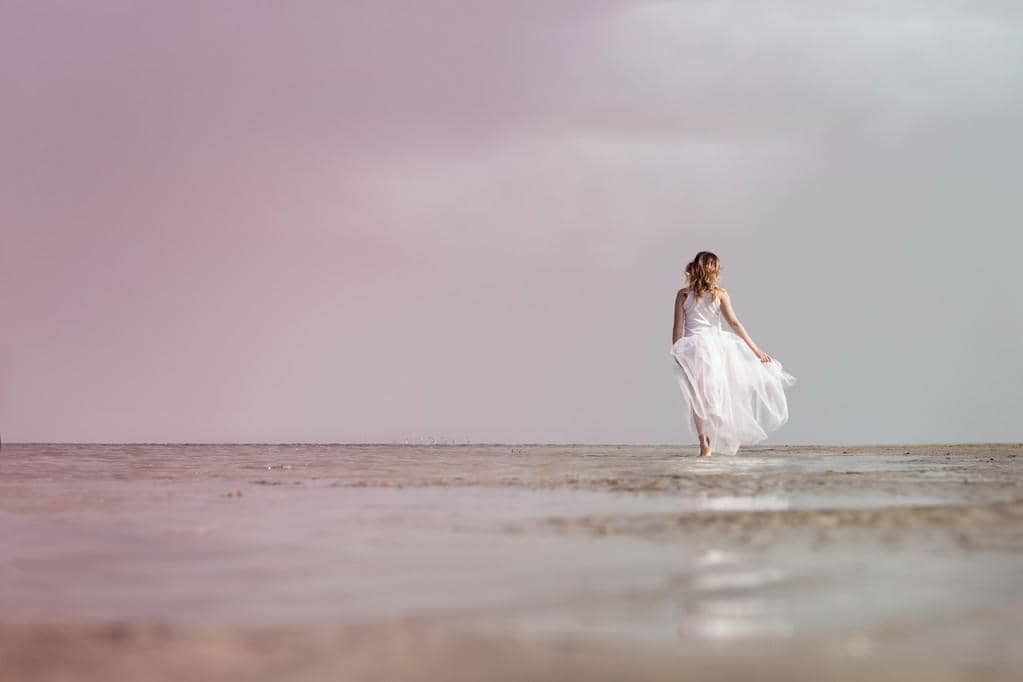 Good Wife Syndrome: 9 Hidden Ways it Becomes Walk Away Wife 5 woman walking on the sea shore