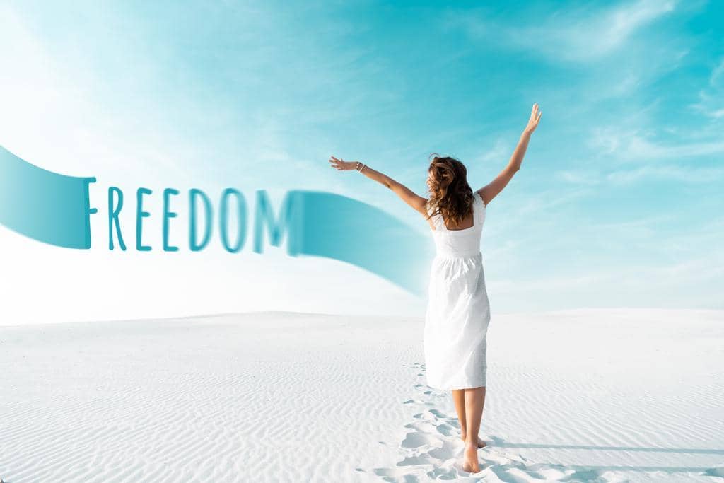 Closure After Divorce: 9 Painful Truths About Letting Go Gracefully 12 back view beautiful girl white dress hands air sandy beach