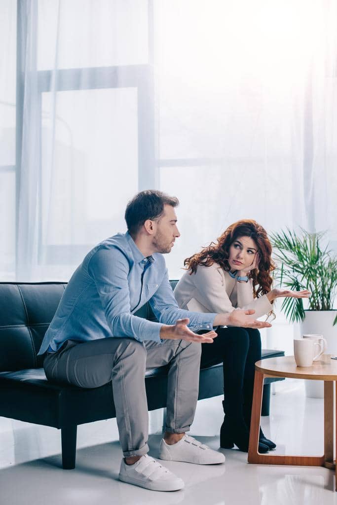 Guide to Honest Divorce Talk: 5 Examples and Possible Reactions 7 divorcing young couple arguing psychiatrist office