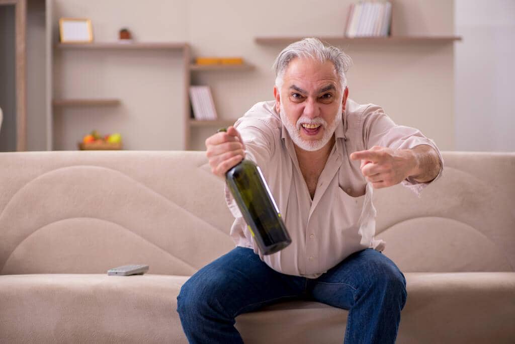 30 Ways to Protect Yourself From an Angry Drunk 6 old man drinking alcohol at home