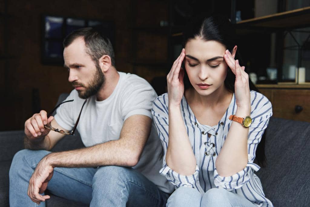 How I Knew Divorce Was the Best Choice: 5 Clear Signs 6 sad young couple sitting sofa home quarrel