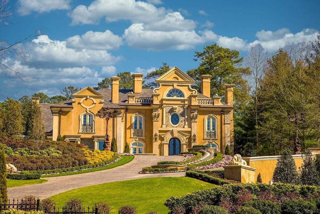 9 Fake Alpha Male Traits: Eye-Opening Ways to Spot a Phony 11 large stucco mansion on hill