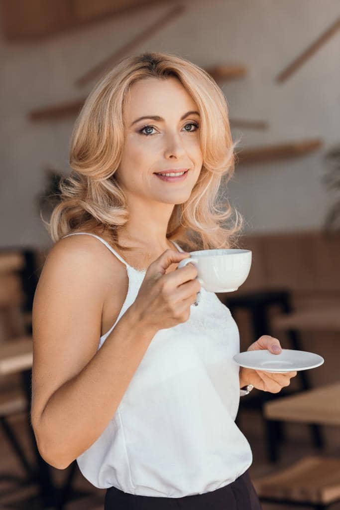 5 Stages of Healing After Divorce: A Bold New Beginning 9 woman drinking coffee