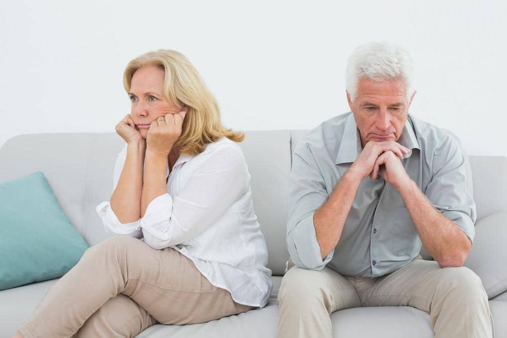 Guide to Honest Divorce Talk: 5 Examples and Possible Reactions 3 displeased relaxed senior couple at home