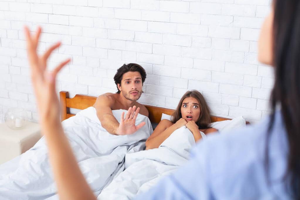 9 Outrageous Lies Men Believe to Justify Infidelity 3 infidelity girlfriend catching cheating boyfriend lying bed another woman home