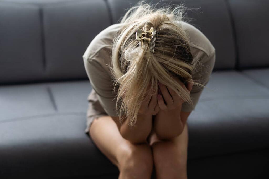 My Partner Abuses Me When I'm Already Hurting 5 depressed upset young woman feeling hurt sad stressed troubled unwanted