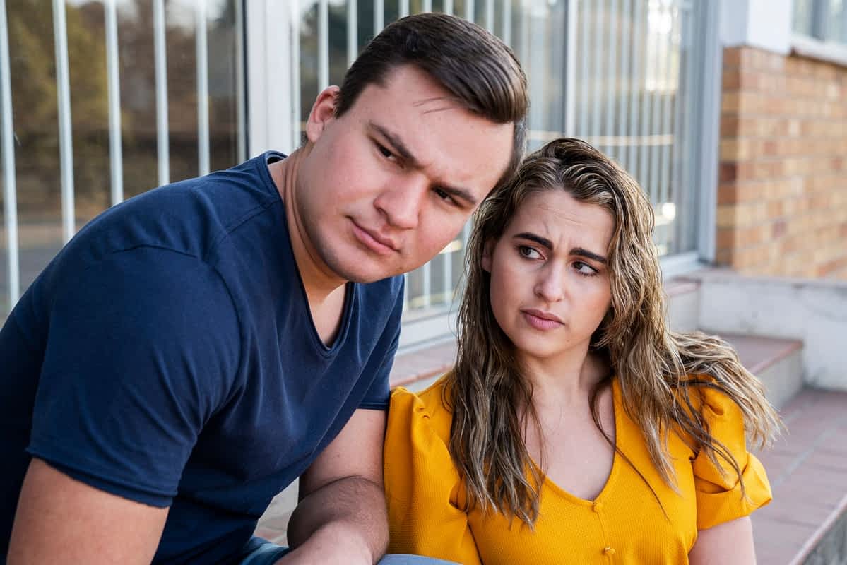 Woman looks quizzically at her emotionally immature husband