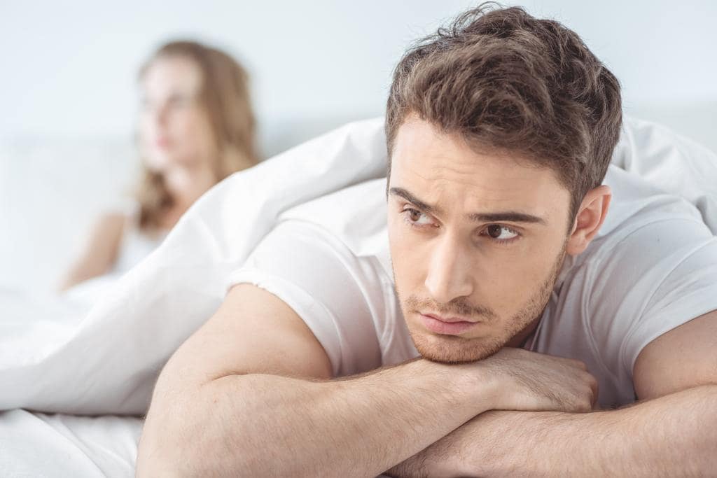 10 Big Lies We Tell Ourselves in Toxic Relationships 3 stock photo young dissatisfied man
