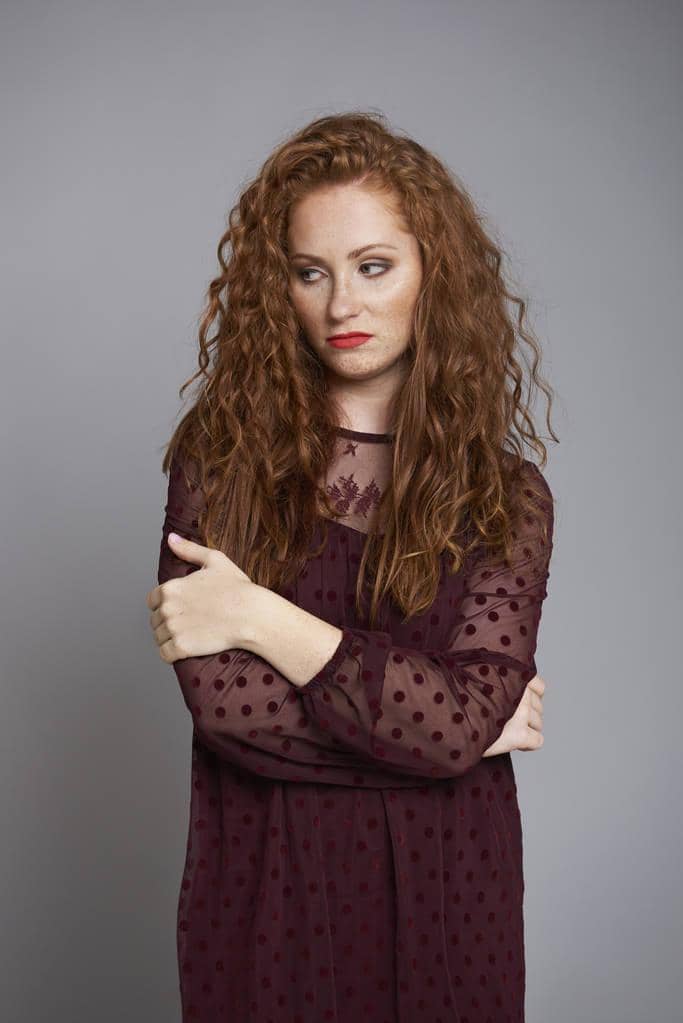 5 Stealthy Resentment Stages in Relationships You Need to Avoid 5 portrait bored resentful woman