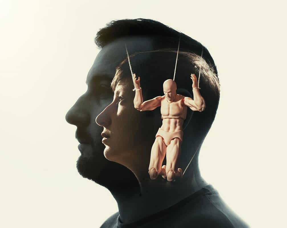 multiple exposure man woman silhouette marionette rope her hands concept