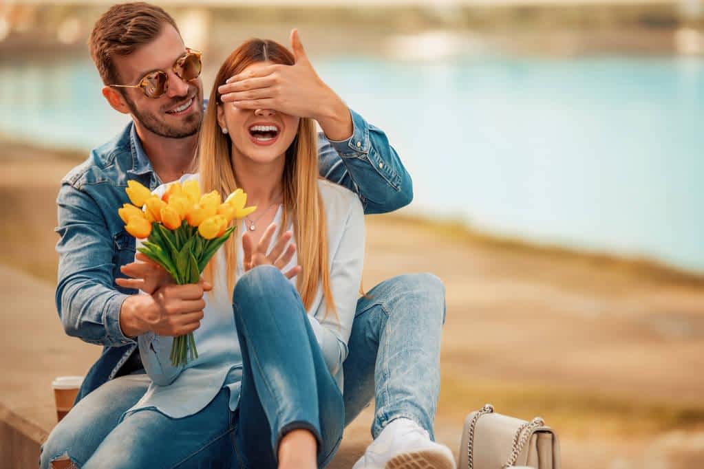 happy young couple having fun outdoors smiling 1