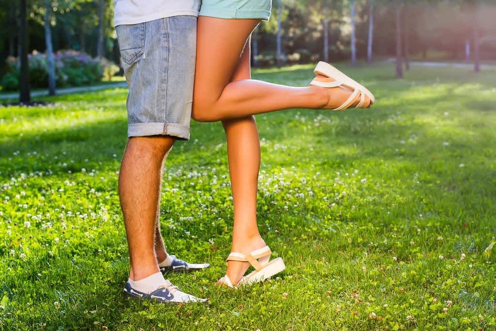 lovers kissing in the park