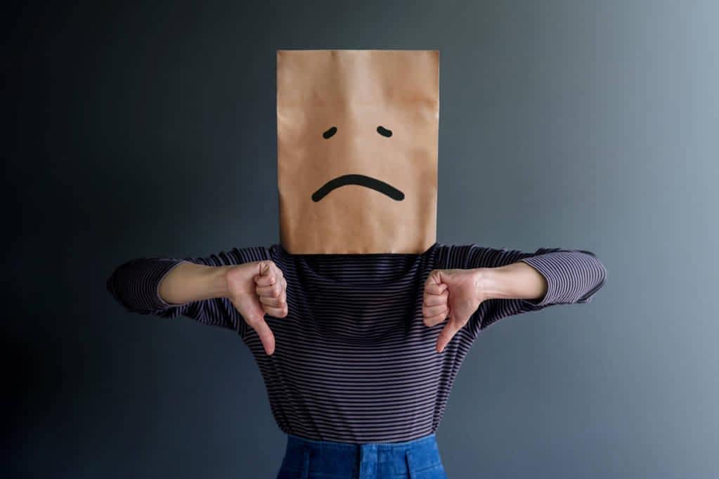 woman covered her face paper