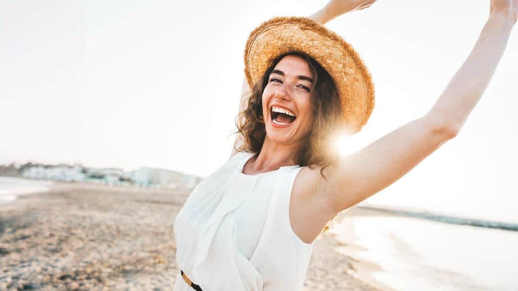 happy beautiful young woman smiling beach side delightful girl enjoying