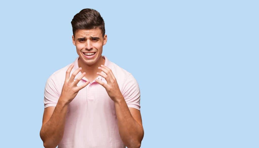 young handsome man angry upset