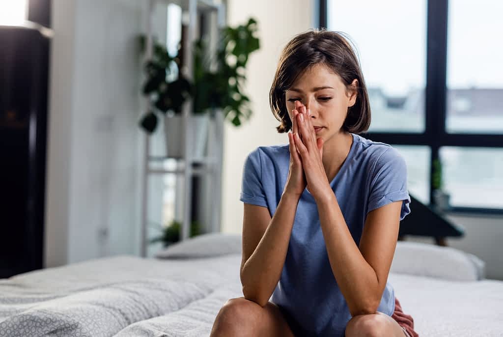 Young woman contemplating the divorce threats husbands make