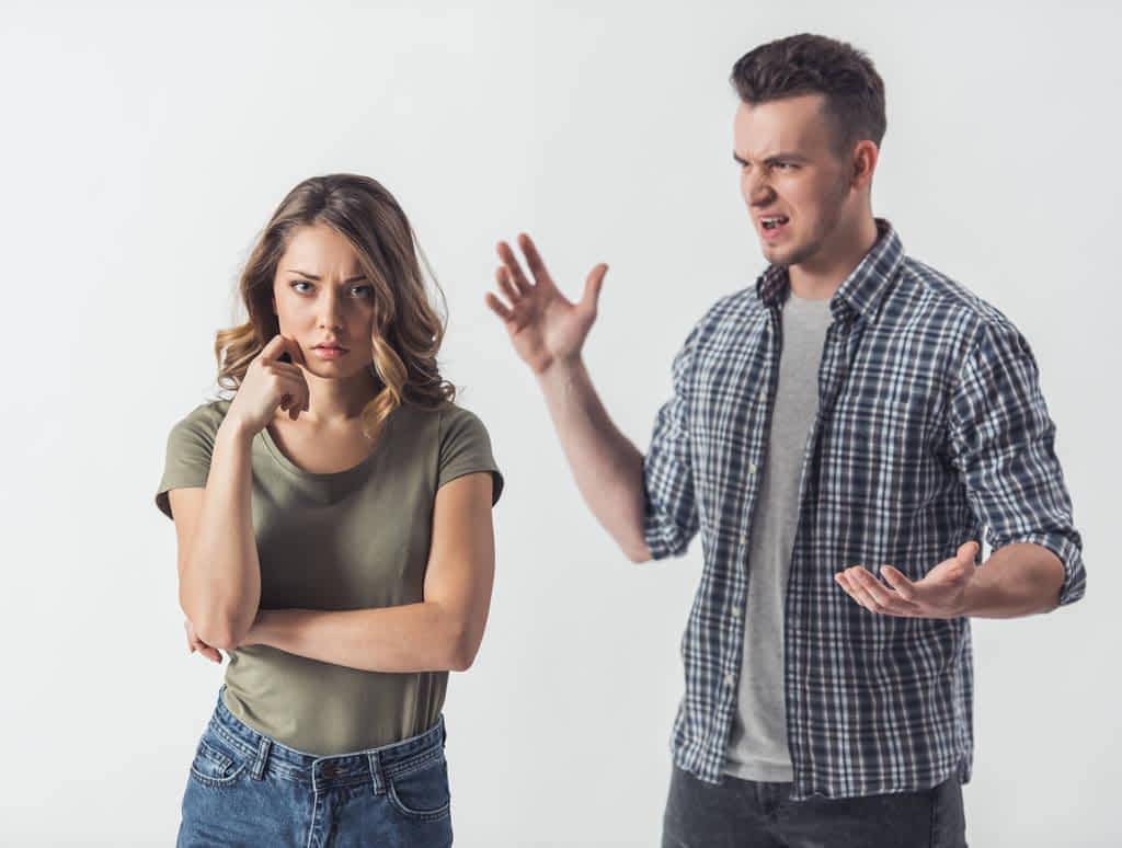 young couple having problems guy yelling his girlfriend