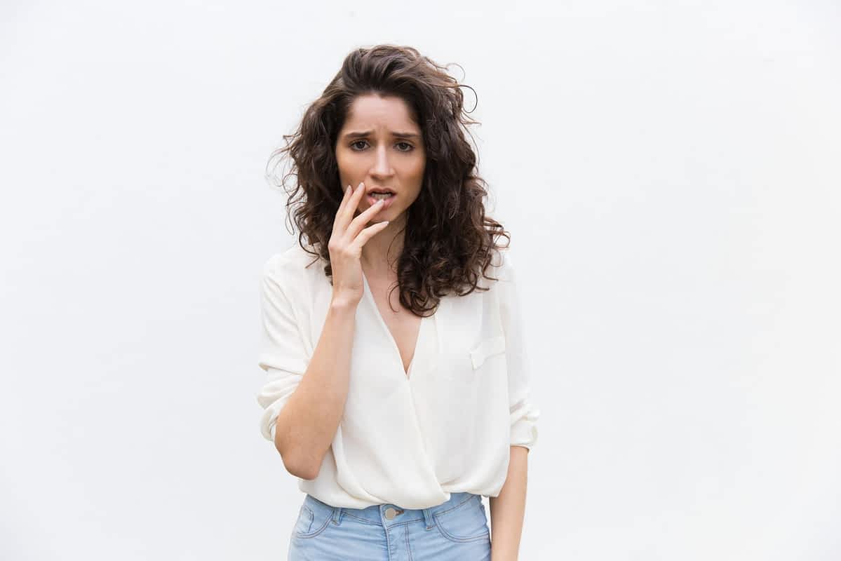 Pensive, worried woman thinking about the divorce threats husbands make