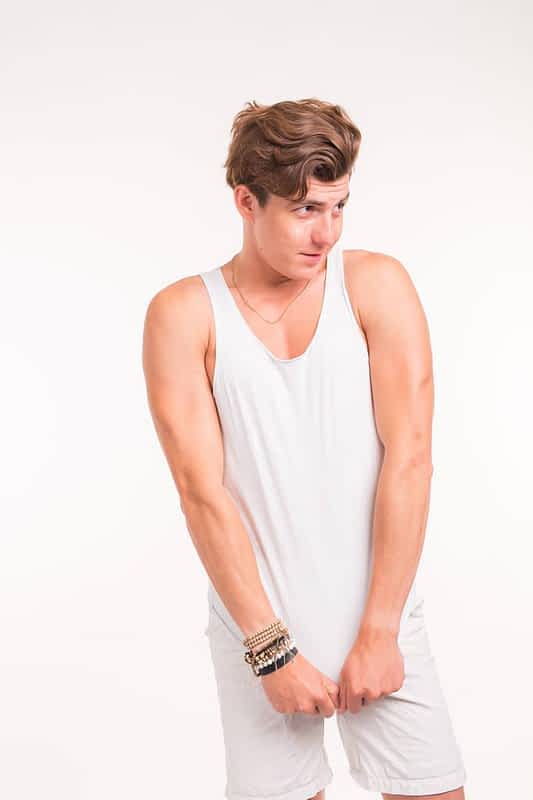 nervous stressed young nerdy guy man on white background negative emotion