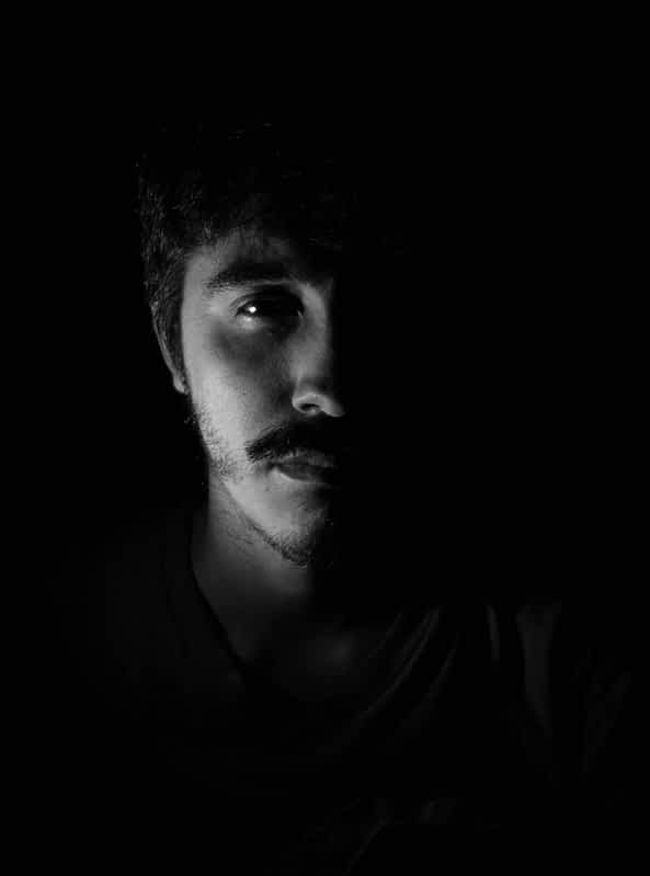 scary man alone in shadow