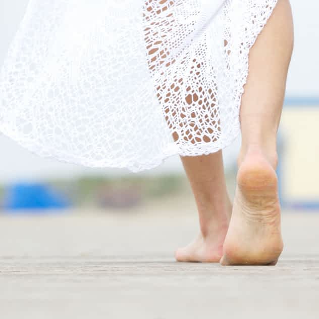 woman's feet walking away