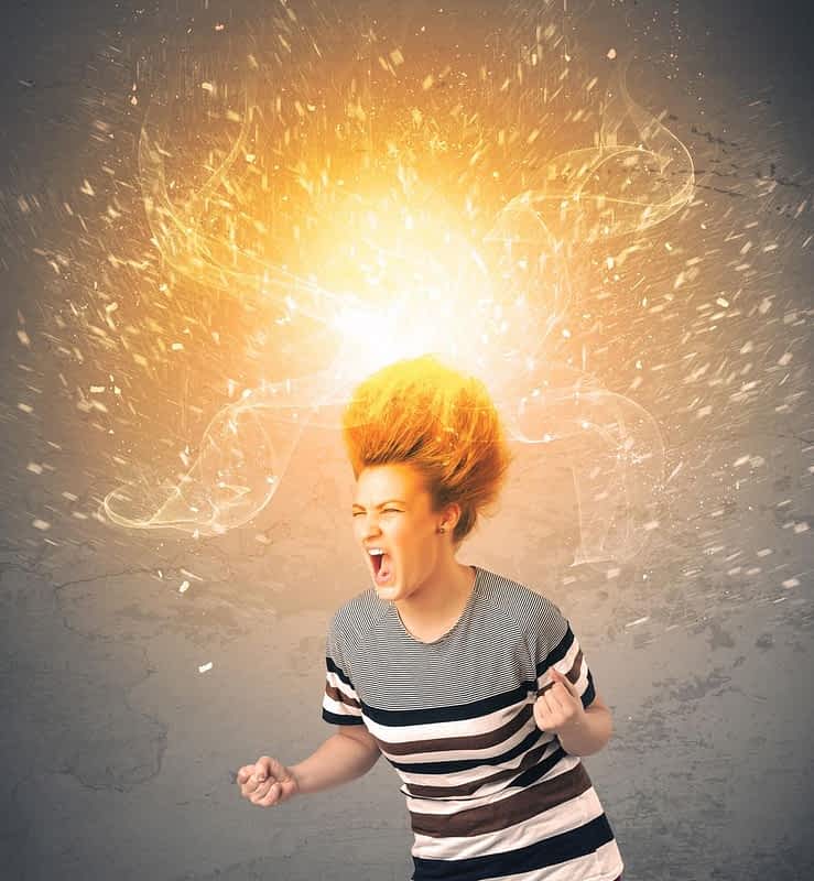 14 Ways Childhood Emotional Neglect Leads to Toxic Relationships 11 young woman with energetic exploding red hair