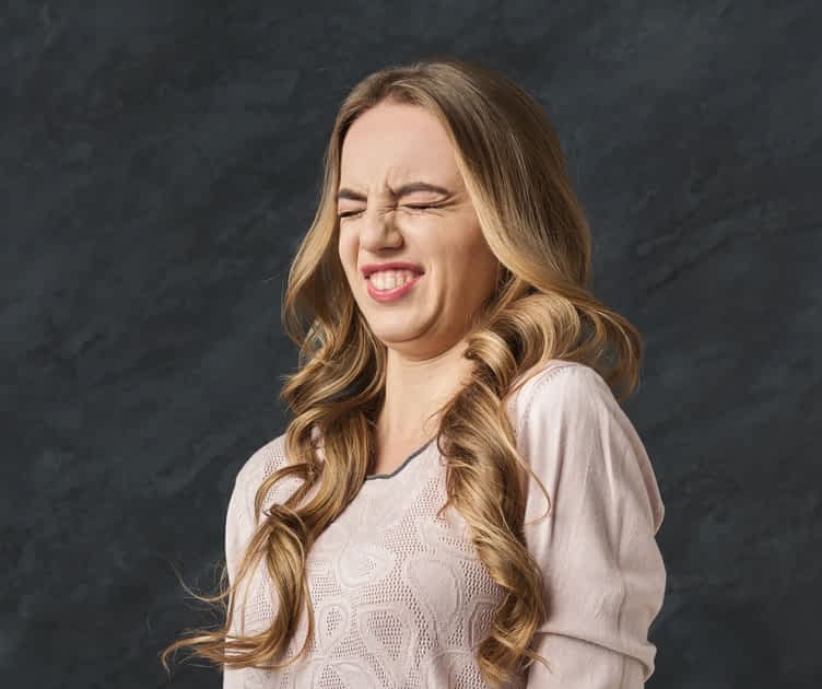 Woman looking disgusted