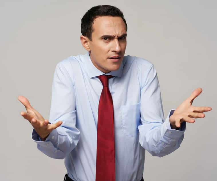 man shrugging and showing contempt and mockery