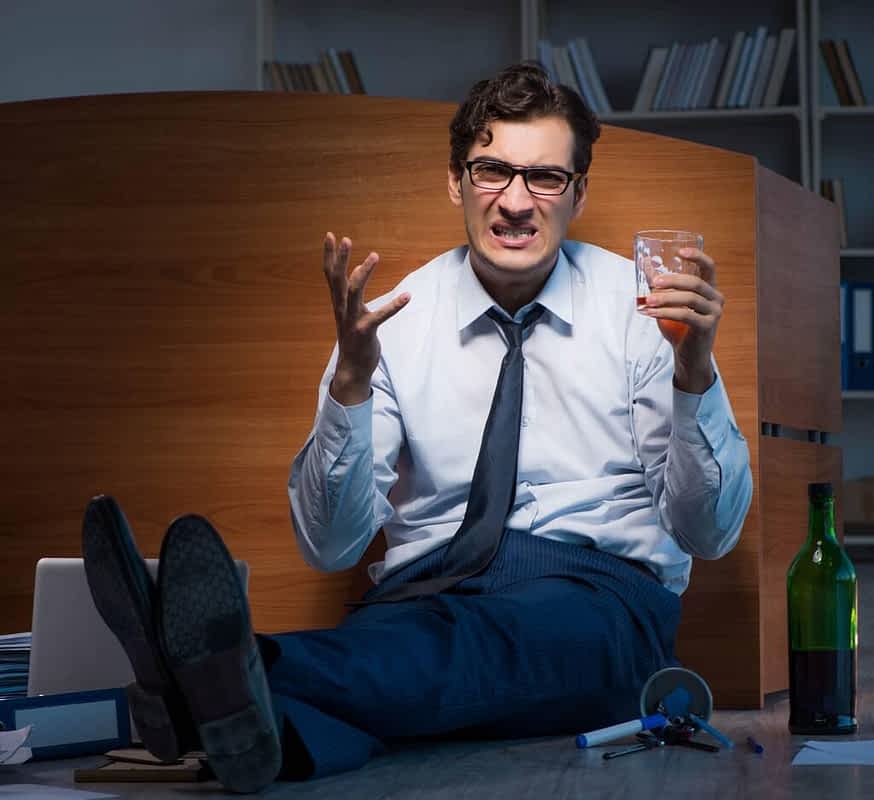 30 Ways to Protect Yourself From an Angry Drunk 10 stressed businessman working overtime in depression