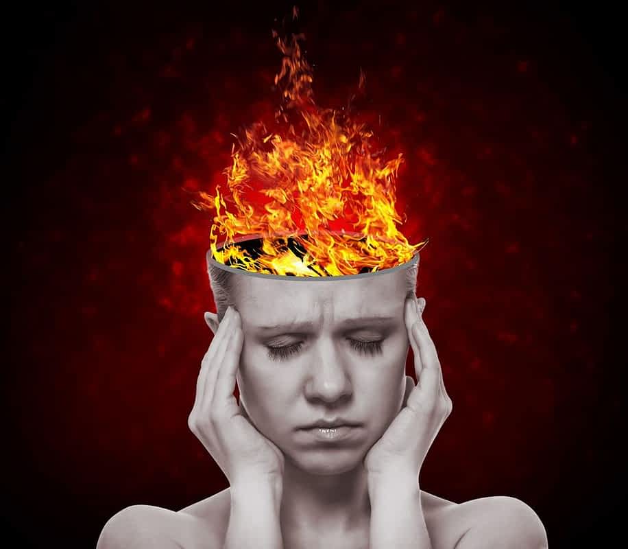 concept an idea head of woman with a flame of fire