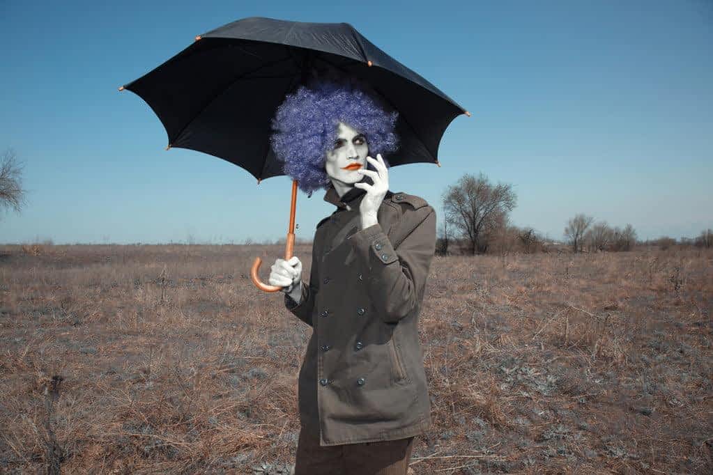 Machiavellianism in Relationships: 4 Helpful Ways to Handle It 3 stock photo clown with umbrella