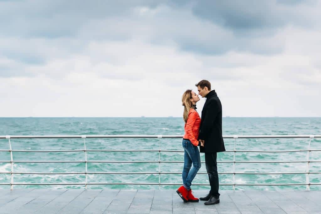 lovers on the beach in early spring