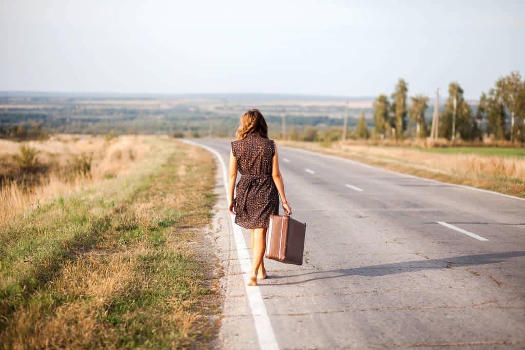 girl suitcase girl puteshestvennica wait carriageway transport stops machine