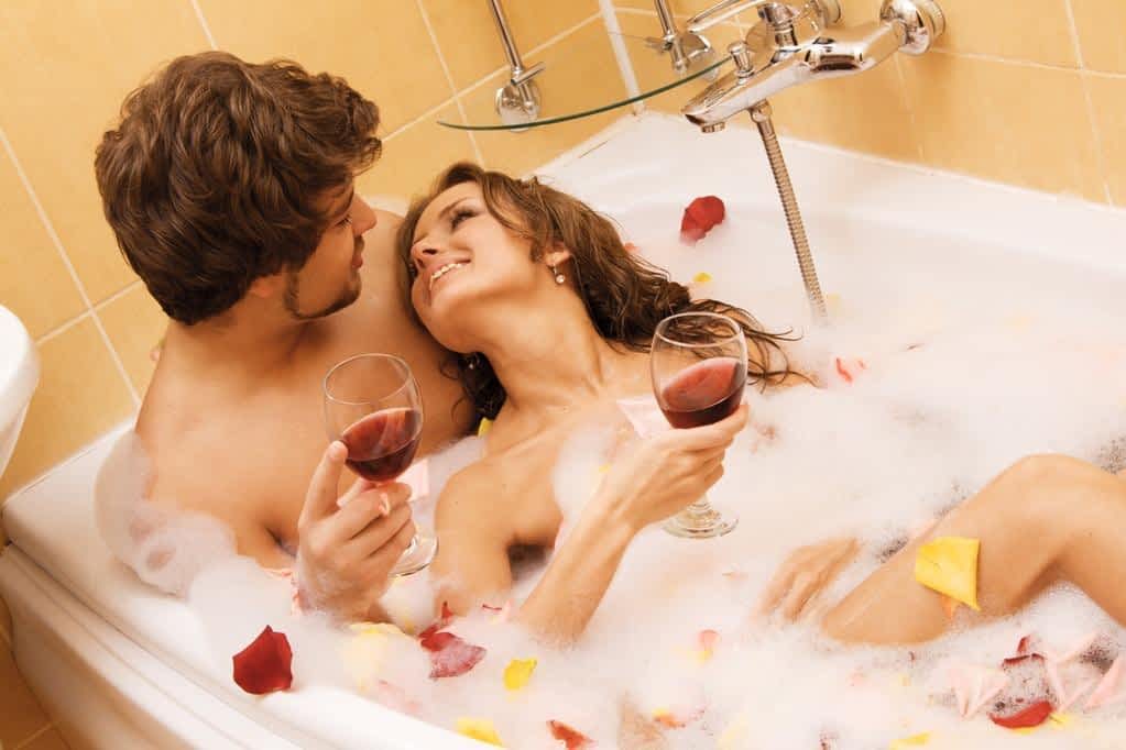 beautiful young couple enjoying a bath