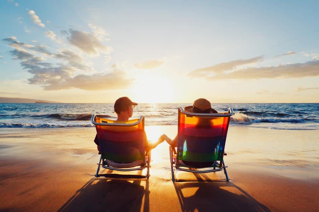 Fragile Masculinity: The Root of Controlling Behavior in Relationships 9 happy romantic couple enjoying beautiful sunset at the beach