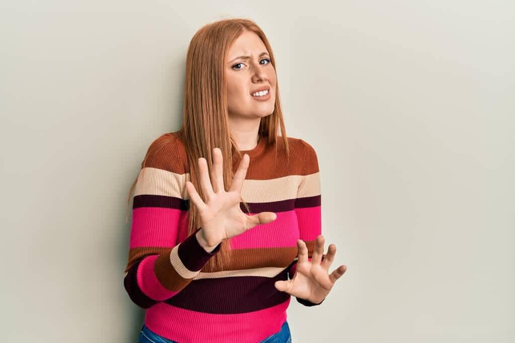 Why Men Mistake Kindness For Flirting 9 young irish woman wearing casual clothes disgusted expression displeased fearful