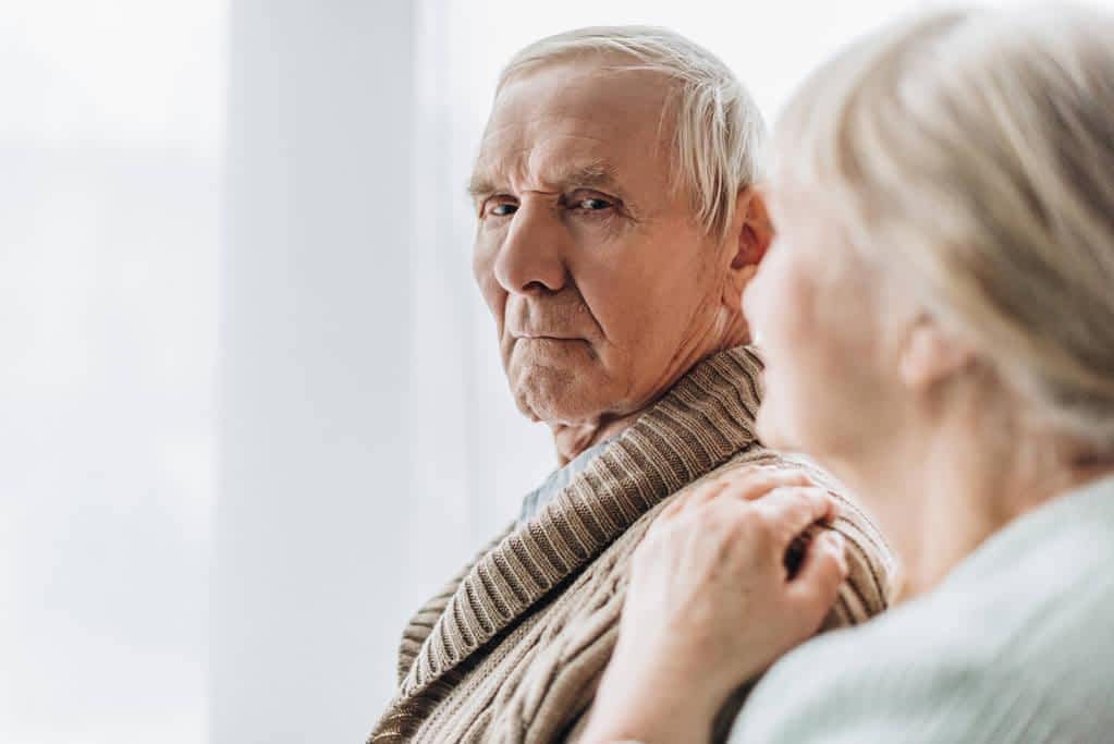 The Divorce No One Saw Coming: When Starting Over at 60 Stings More Than You Expected 3 grumpy senior husband gives wife a dirty look