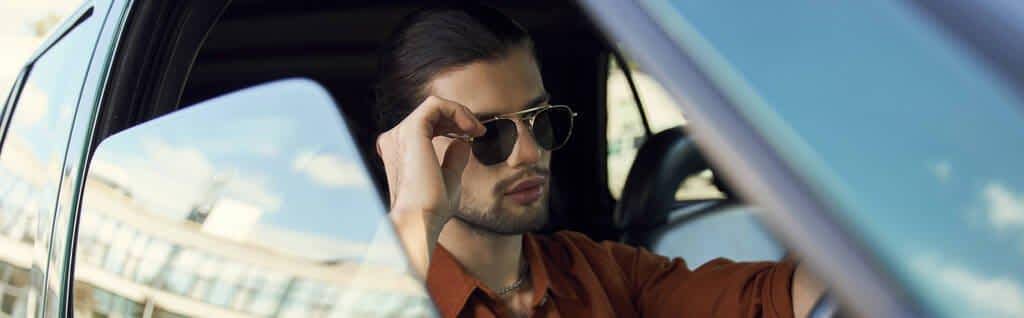 Fragile Masculinity: The Root of Controlling Behavior in Relationships 8 young stylish man trendy accessories posing steering wheel touching sunglasses